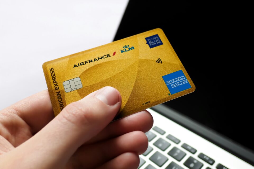 credit points card in front of computer